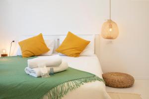 Postel nebo postele na pokoji v ubytování Twins Idola Apartments