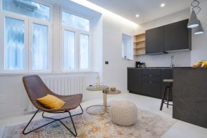 TV a/nebo společenská místnost v ubytování Twins Idola Apartments