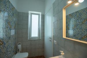 Koupelna v ubytování Casa Floris