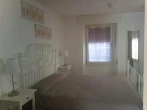 Postel nebo postele na pokoji v ubytování B&B AMaLu'