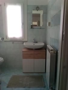 Koupelna v ubytování B&B AMaLu'
