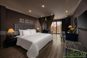 Voodi või voodid majutusasutuse Matilda Boutique Hotel & Spa toas
