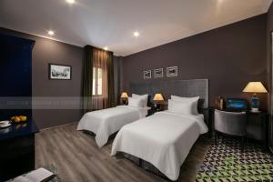 Voodi või voodid majutusasutuse Matilda Boutique Hotel & Spa toas