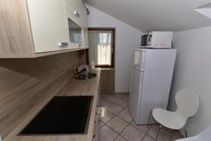 Kuchyň nebo kuchyňský kout v ubytování Studio apartment The View