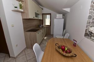 Kuchyň nebo kuchyňský kout v ubytování Studio apartment The View
