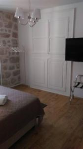TV a/nebo společenská místnost v ubytování Rilati palace Dubrovnik 3