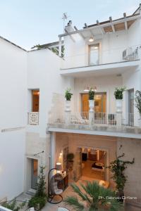 Balkón nebo terasa v ubytování Palazzo Dei Dondoli