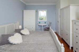 Posteľ alebo postele v izbe v ubytovaní Apartament Playa Baltis 66 z widokiem na morze