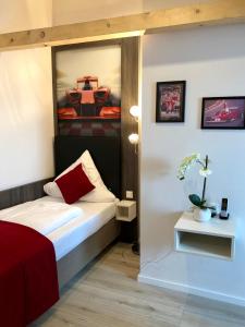 Cama ou camas em um quarto em Star Apart Hotel Sachsenhausen