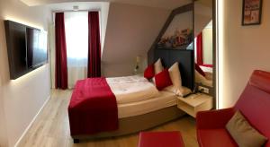 Cama ou camas em um quarto em Star Apart Hotel Sachsenhausen