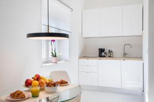Kuchyň nebo kuchyňský kout v ubytování Twins Idola Apartments