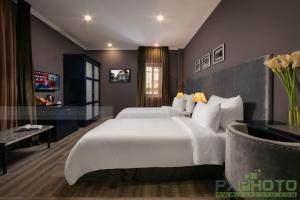 Voodi või voodid majutusasutuse Matilda Boutique Hotel & Spa toas