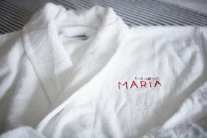 Certifikát, hodnocení, plakát nebo jiný dokument vystavený v ubytování The Hotel Maria