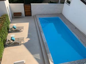 The swimming pool at or close to 2I rooms