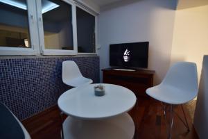 TV a/nebo společenská místnost v ubytování Studio apartment The View
