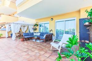 A balcony or terrace at Charming Apartment with a Cozy Terrace