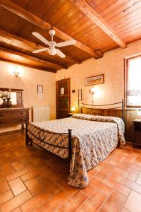 Postel nebo postele na pokoji v ubytování Agriturismo Casale Sasso