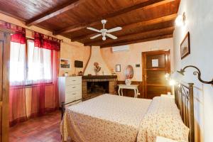 Postel nebo postele na pokoji v ubytování Agriturismo Casale Sasso