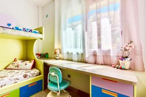 A bed or beds in a room at Charming Apartment with a Cozy Terrace