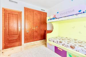A bed or beds in a room at Charming Apartment with a Cozy Terrace