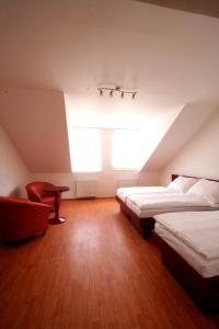 Un pat sau paturi într-o cameră la Apart Hotel Susa
