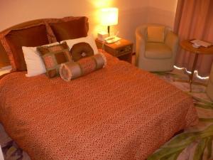 Postel nebo postele na pokoji v ubytování Hotel Villa Kuretake
