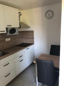 Kuchyň nebo kuchyňský kout v ubytování Jack's Apartments
