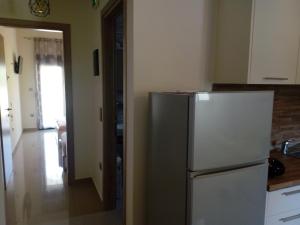 Kuchyň nebo kuchyňský kout v ubytování Ioannas