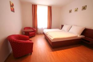 Posteľ alebo postele v izbe v ubytovaní Apart Hotel Susa