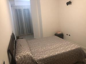 A bed or beds in a room at Alle Torri