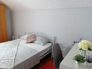Postel nebo postele na pokoji v ubytování Apartmani Mataija