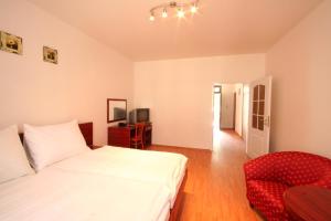 Posteľ alebo postele v izbe v ubytovaní Apart Hotel Susa