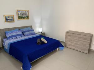Postel nebo postele na pokoji v ubytování Island Break Residence