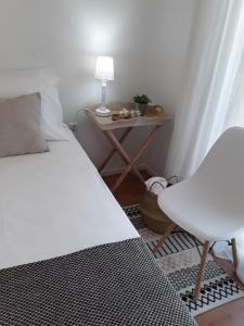 Postel nebo postele na pokoji v ubytování MEROPI STUDIOS