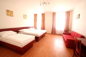 Posteľ alebo postele v izbe v ubytovaní Apart Hotel Susa
