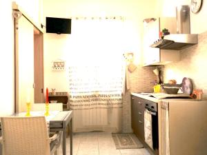Kuchyň nebo kuchyňský kout v ubytování Casa Terrazzata in centro