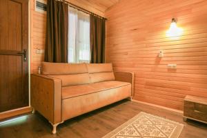 A seating area at Cinderella Pension & Bungalow