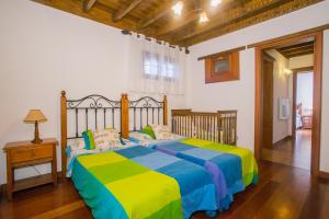 Postel nebo postele na pokoji v ubytování A1 Casas Y Villas juani y juan lanzarote (tomaren) Free WiFi + 26 fotografií