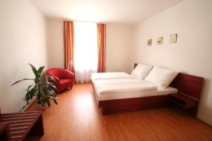 Posteľ alebo postele v izbe v ubytovaní Apart Hotel Susa