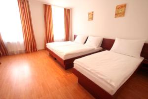 Posteľ alebo postele v izbe v ubytovaní Apart Hotel Susa