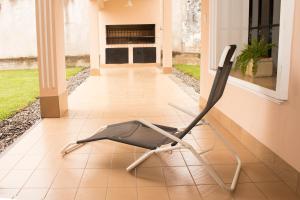 a chair on the porch of a house at Lo de Viviana in San Salvador de Jujuy