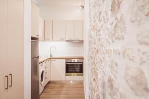 Kuchyň nebo kuchyňský kout v ubytování S&G Corfu Old Town Apartments - The Volto Suite