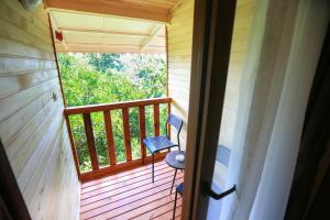 A balcony or terrace at Cinderella Pension & Bungalow