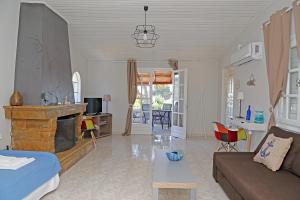 A television and/or entertainment centre at Calypso Apartments