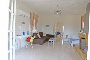 A bed or beds in a room at Calypso Apartments