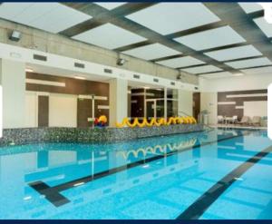 Bazén v ubytování Onyx Family nebo v jeho okolí