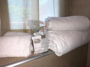 Rúm í herbergi á ALPieve Albergo Pieve