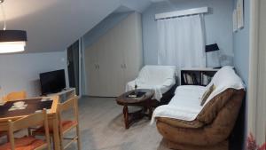 O zonă de relaxare la Apartments Sovran Vila Marija