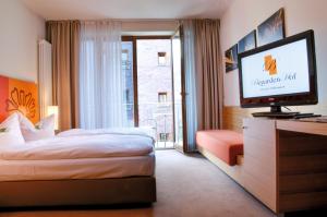 TV a/nebo společenská místnost v ubytování Hotel Begardenhof