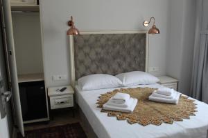 Ліжко або ліжка в номері Good Night Hotel Istanbul